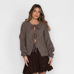 Cardigan oversize avec des nœuds