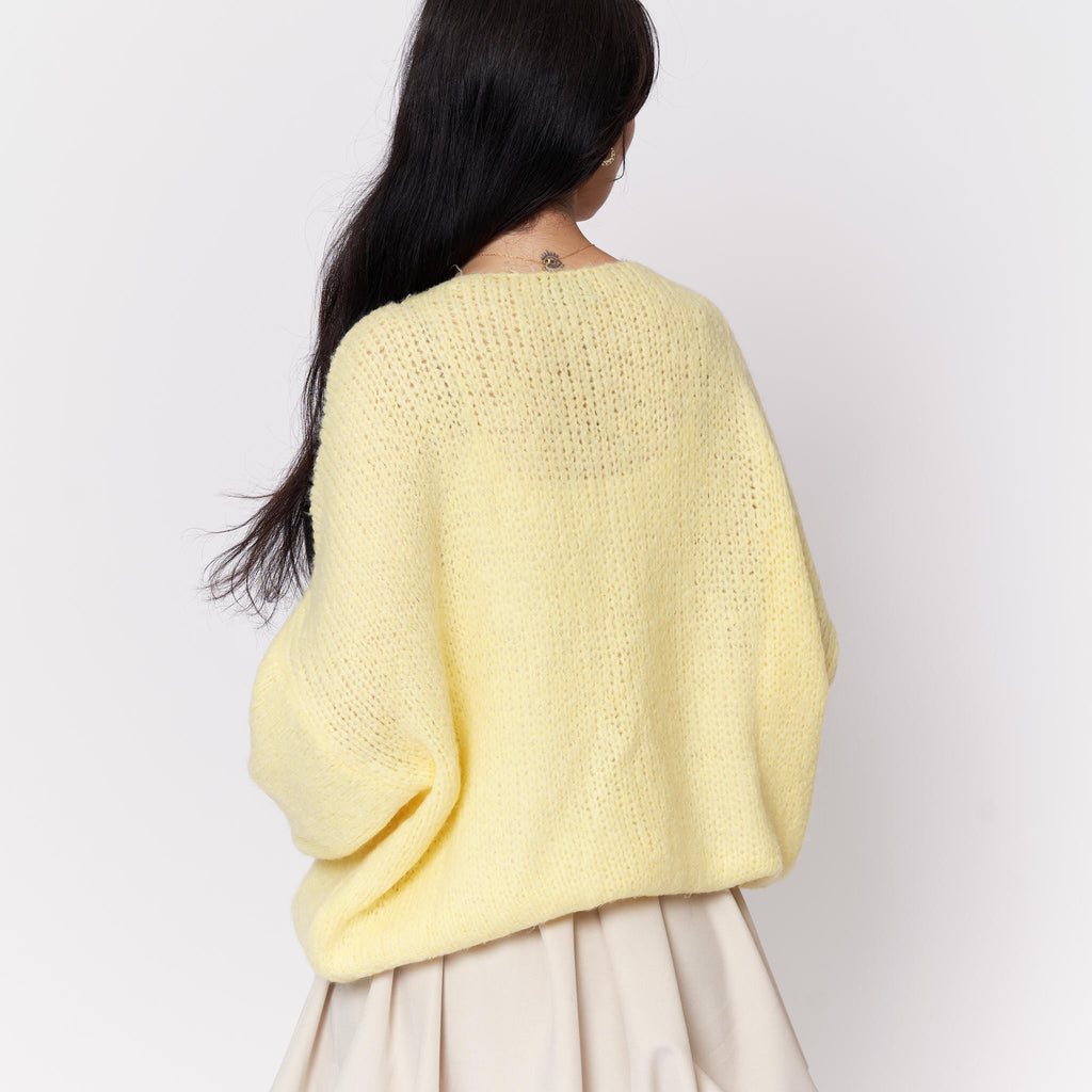 Cardigan oversize avec des nœuds