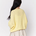 Cardigan oversize avec des nœuds