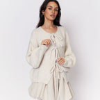 Cardigan oversize avec des nœuds