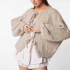 Cardigan oversize avec des nœuds